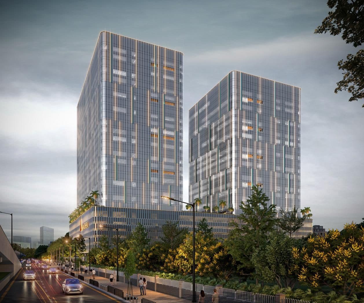 Kamdhenu Synergy Square — twin commercial towers, street view at dusk